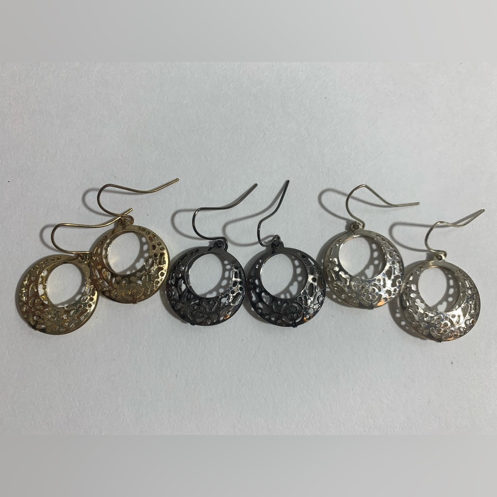 Set of 3 pairs of gold, silver, and black small circular hook earrings